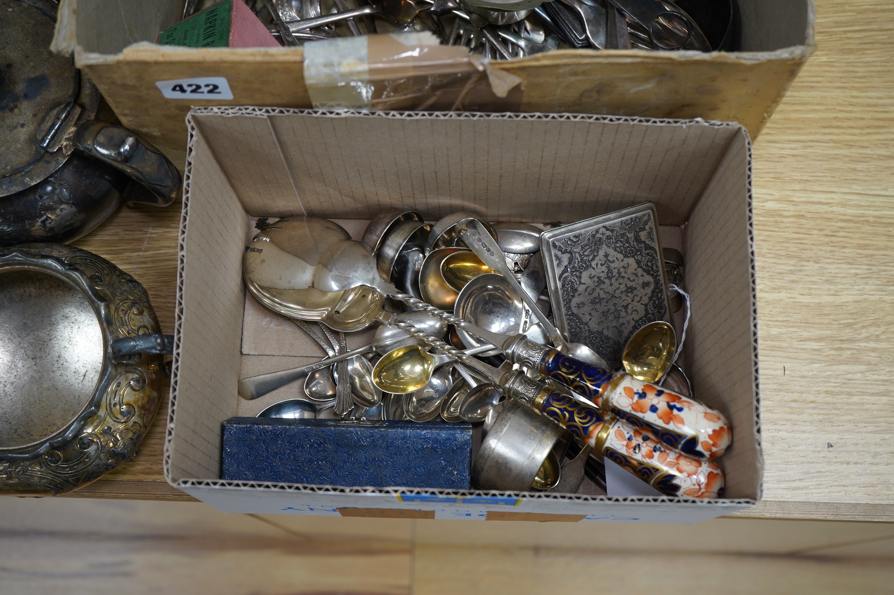 A small quantity of silver flatware, assorted plated cutlery, napkin rings and servers. Condition - varies, mostly fair